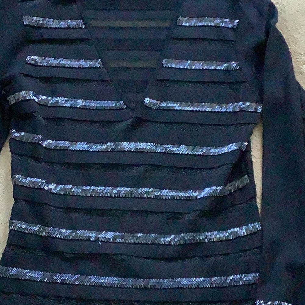 Women’s black top by Essence